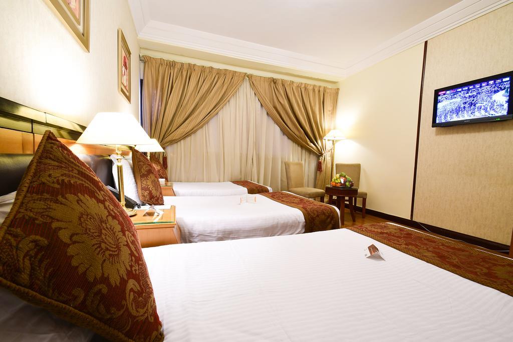Al Ansar Golden Tulip Hotel Medina Bagian luar foto