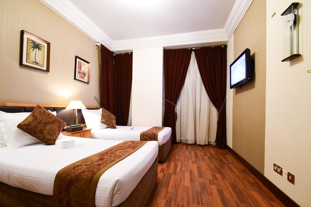 Al Ansar Golden Tulip Hotel Medina Bagian luar foto