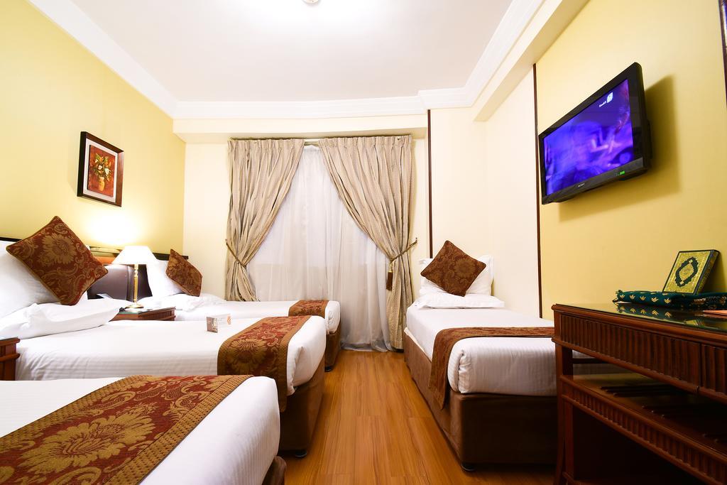 Al Ansar Golden Tulip Hotel Medina Bagian luar foto