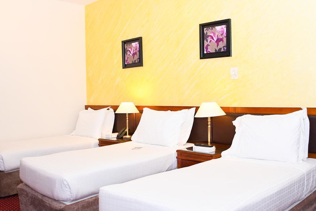Al Ansar Golden Tulip Hotel Medina Bagian luar foto
