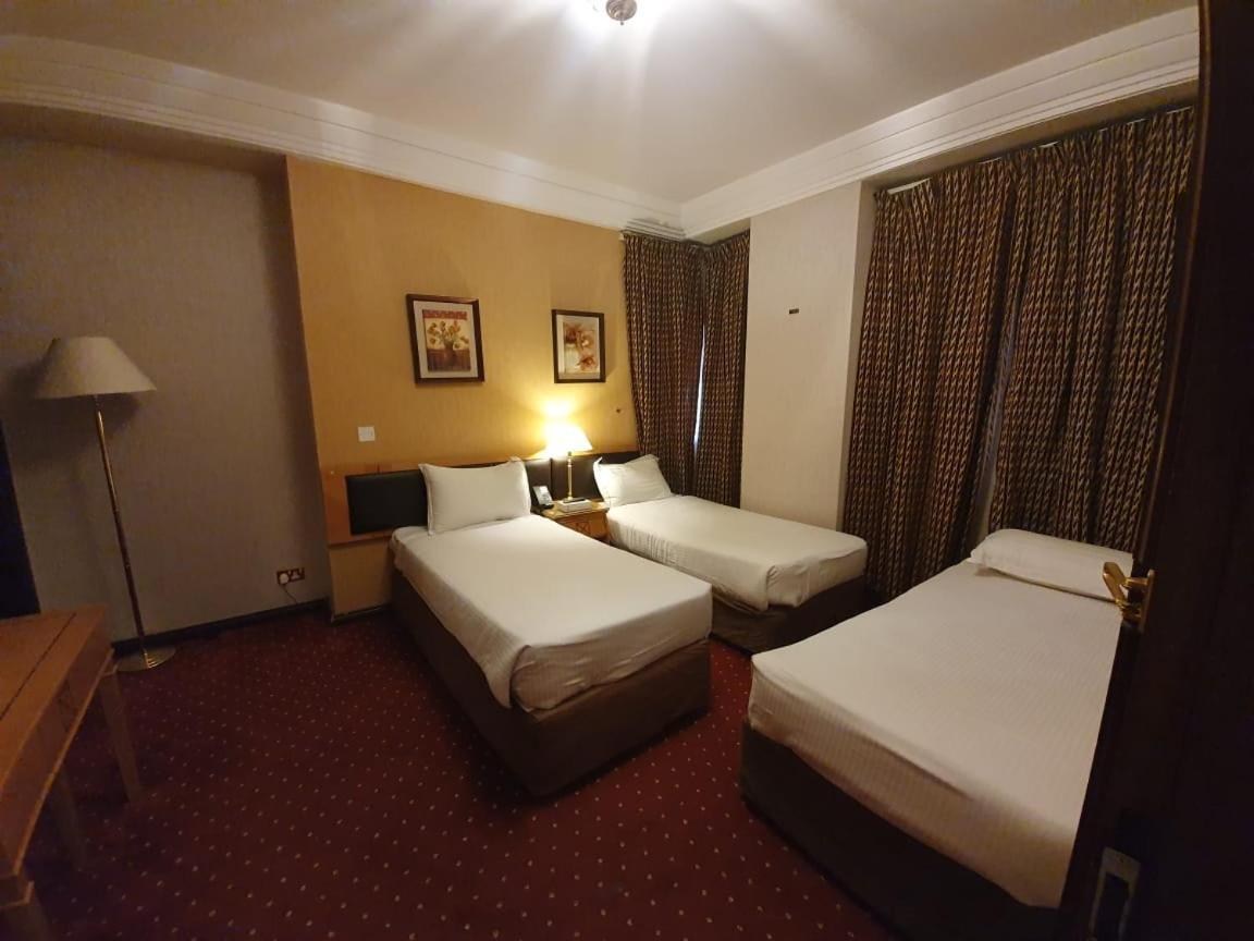 Al Ansar Golden Tulip Hotel Medina Bagian luar foto